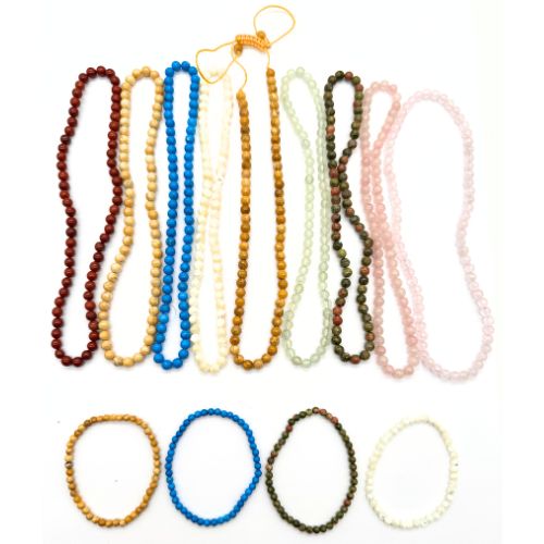 LOT DE 9 COLLIERS ET 4 BRACELETS BOULES